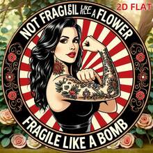 A 2D Flat Wooden Sign With The Text "Not Fragile Like Flowers, Fragile Like Bombs". This Round Badge Features A Tattooed Woman And A Floral Sunburst Pattern, With Pre-Drilled Holes As Shown In The Size Chart - Multicolor - View 1