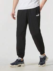 PUMA Solid Color Casual Woven Drawstring Mid-Rise Knit Joggers Unisex Black - Black - View 1