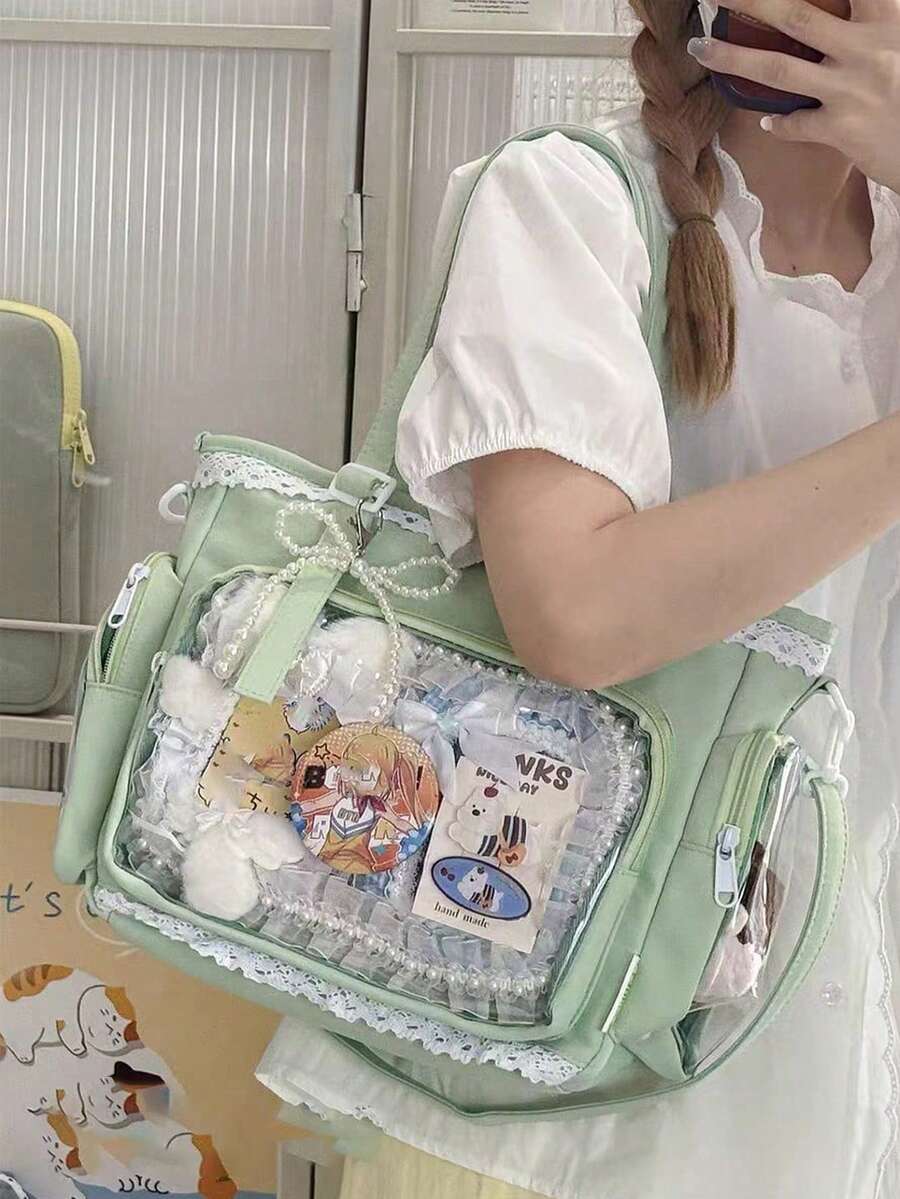 1個日系軟妹清新百搭女款單肩包，珍珠蝴蝶結與蕾絲飾邊展現精緻優雅，動漫JK漫畫展DIY透明裝飾包，雙側口袋透明層日常休閒大容量托特包，學生書包輕便托特包，可愛甜美風格極具吸引力斜背包，尼龍材質防水面料痛包展示動漫周邊，學生上學通勤包，參加漫畫展、購物、派對、旅行