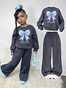 Bộ áo nỉ cổ tròn và quần nỉ in họa tiết nơ cho bé tập đi - Màu xám đen - Xem 1