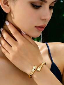 1 pieza Brazalete de Puño Abierto Ajustable de Primavera con Diseño Elegante y Fresco de Metal Pulido en Forma de Gota de Agua Cruzada - Amarillo Oro - Ver 2
