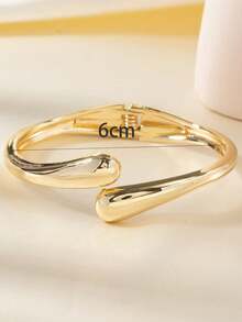 1 pieza Brazalete de Puño Abierto Ajustable de Primavera con Diseño Elegante y Fresco de Metal Pulido en Forma de Gota de Agua Cruzada - Amarillo Oro - Ver 4