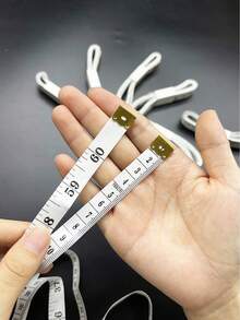 雙標尺柔性軟量尺（英制 + 公制），1.4cm 寬 * 1.5m 長可彎曲布製縫紉尺，適用於服裝製作與身體圍度測量；輕量口袋便攜設計，適合縫紉手工藝與減重身體測量追蹤 - 白色軟尺 - 查看 5