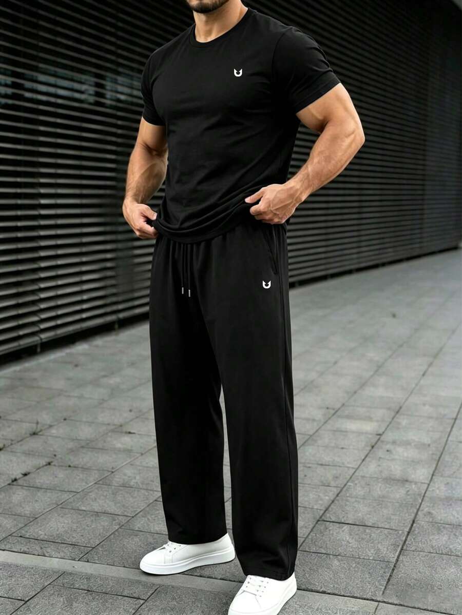 Plus Size 2-Piece Set T-Shirt And Straight Leg Pants Outfit "Hook U" Small Logo Print Men's Casual Short Sleeve Knit T-Shirt And Sweatpants Set, Spring/Autumn Men's Wear, Machine Washable - Black - View 1