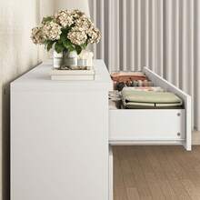 12 DRAWER CHEST FEATURES SMOOTH METAL DRAWER SLIDES AND A WIDE WOODEN CABINET, OFFERING AMPLE STORAGE SPACE. IT'S PERFECT FOR USE AS A BEDROOM DRESSER OR VANITY, AND COMES WITH UNIQUE RECESSED HANDLES AND STURDY LEGS. - White - View 8