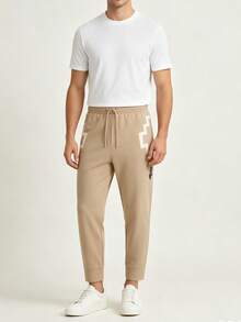 PUMA X PRONOUNCE Unisex Geometric Print Drawstring Cropped Knit Pants Khaki - Khaki - View 1