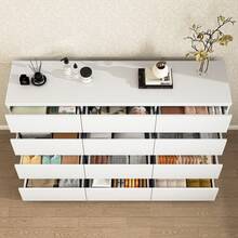 12 DRAWER CHEST FEATURES SMOOTH METAL DRAWER SLIDES AND A WIDE WOODEN CABINET, OFFERING AMPLE STORAGE SPACE. IT'S PERFECT FOR USE AS A BEDROOM DRESSER OR VANITY, AND COMES WITH UNIQUE RECESSED HANDLES AND STURDY LEGS. - White - View 11