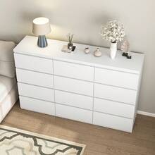 12 DRAWER CHEST FEATURES SMOOTH METAL DRAWER SLIDES AND A WIDE WOODEN CABINET, OFFERING AMPLE STORAGE SPACE. IT'S PERFECT FOR USE AS A BEDROOM DRESSER OR VANITY, AND COMES WITH UNIQUE RECESSED HANDLES AND STURDY LEGS. - White - View 3