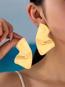 Gold Exaggerated Stud Earrings