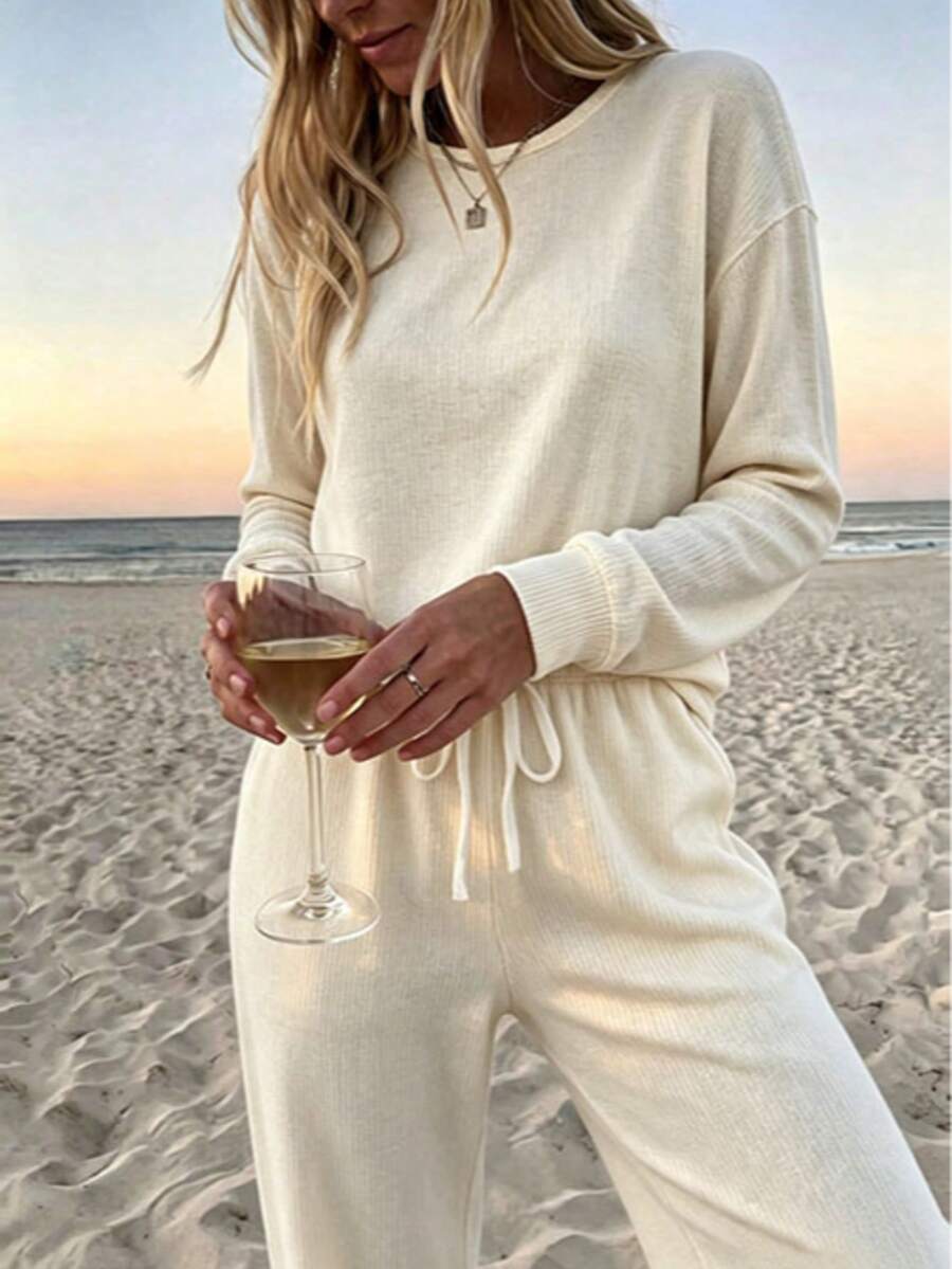 SuofeiMan 女款休閒純色兩件套 長袖圓領口袋上衣搭配抽繩寬腿褲 秋冬居家休閒套裝 優雅風格 - 杏色 - 查看 1