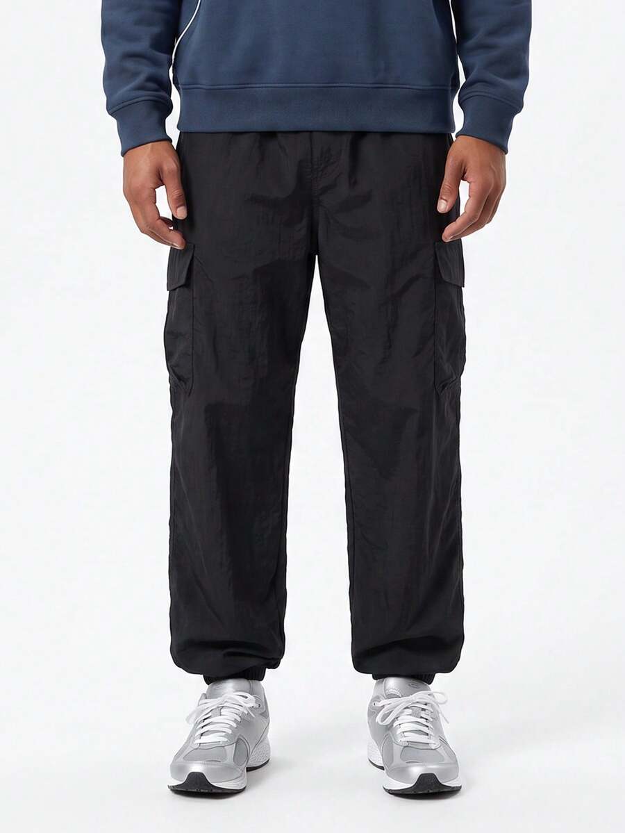 Plus Size Men's Loose Quick-Dry Cargo Pants With Multiple Pockets And Cuffed Hem - Black - View 1