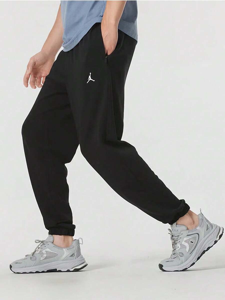 Nike Dri-FIT速乾 針織男子束腳休閒褲 - 黑色 - 查看 1