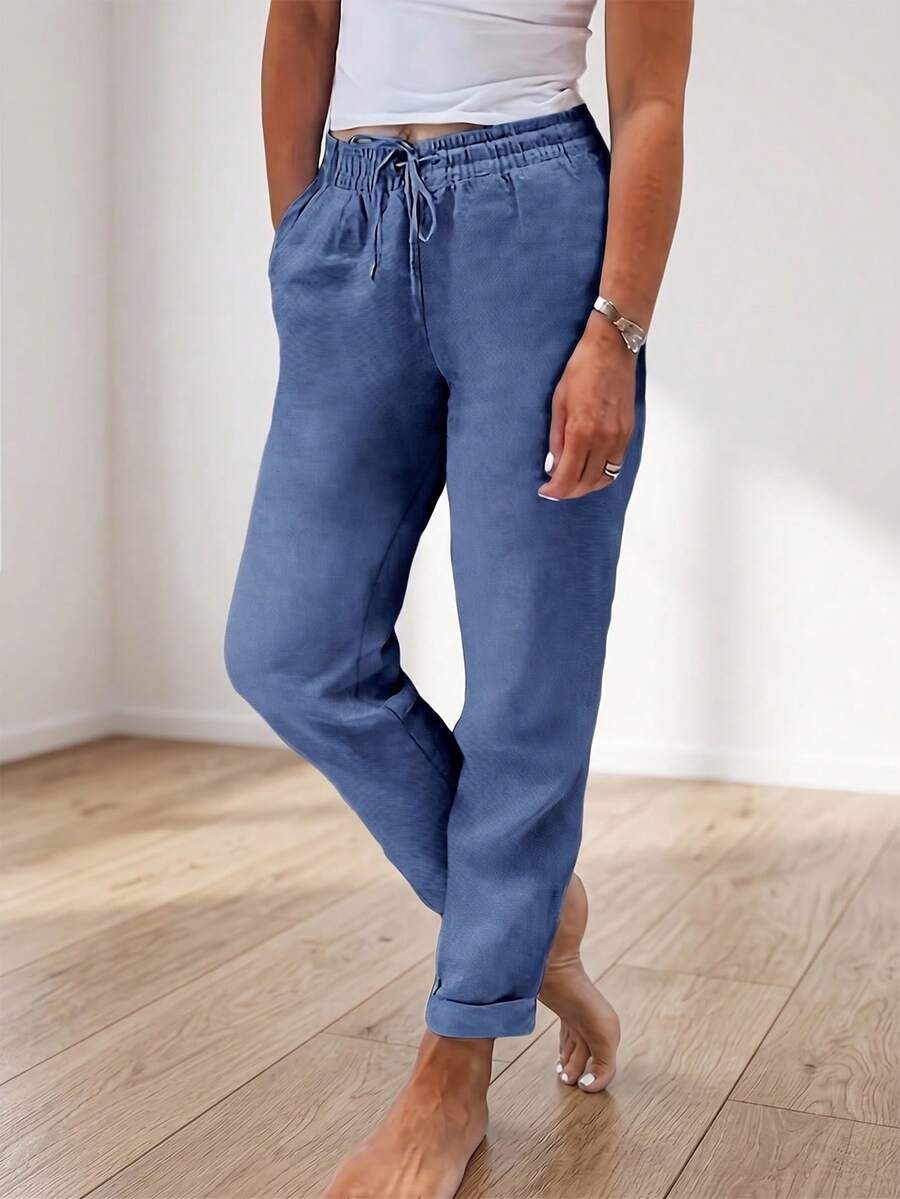 Jessefanie Solid Blue Slim Fit Casual Pants With Elastic Waistband, Drawstring Pockets And Textured Fabric, Versatile For Spring/Summer - Blue - View 1