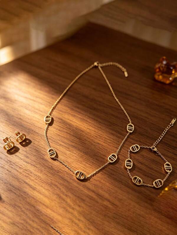 Ensemble de bijoux vintage creux à double D avec nez de cochon, collier bracelet et boucles d'oreilles ovales géométriques, design minimaliste à lignes, style luxe influenceur Ins, polyvalent pour toutes les tenues, convient pour les trajets et les tenues décontractées, met en valeur l'élégance professionnelle, ensemble de bijoux de mode pour femmes, parfait pour un usage personnel ou en cadeau