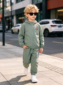 Boys' Spring/Autumn 2 Pieces Set, Solid Color Small Leather Label Zipper Cardigan Jacket With Matching Color Cuffed Long Pants, Suitable For Campus And Outdoor Multi-Scenario Wear - Green - View 3