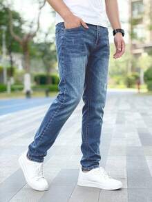 Jeans azules de mezclilla clásicos con estiramiento de grosor medio para hombres - Azul lavado medio - Ver 3