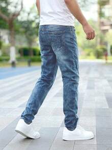 Jeans azules de mezclilla clásicos con estiramiento de grosor medio para hombres - Azul lavado medio - Ver 2
