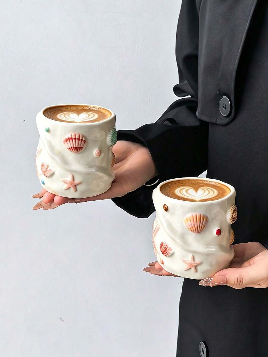 قطعة واحدة كوب سيراميك محمول بتصميم 3D على شكل صدفة وقوقعة، كوب مرسوم يدويًا بتصميم غير متماثل عالي الجمالية، كوب قهوة، عنصر محيطي إبداعي وموضوع لطيف، كوب مياه منزلي، مناسب للقهوة/الحليب/شاي بعد الظهر/الحلويات، هدية للأصدقاء والزملاء والمعلمين