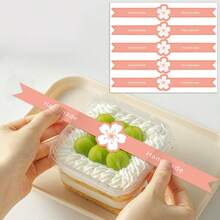 100pcs Cartoon Pink Bow Long Strip Stickers, Long Strip Self-Adhesive Baking Cake Box DIY Sealing Stickers, English Letter And Flower Pattern Sealing Stickers, Can Prevent Lid Accidental Opening And Seal Packaging Boxes, Decorate Baking Cake Box Sealing Stickers, Suitable For Holidays, Weddings, Birthdays, Parties Baking Gift Box Sealing Stickers. - Multicolor - View 1