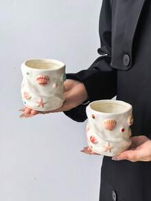 قطعة واحدة كوب سيراميك محمول بتصميم 3D على شكل صدفة وقوقعة، كوب مرسوم يدويًا بتصميم غير متماثل عالي الجمالية، كوب قهوة، عنصر محيطي إبداعي وموضوع لطيف، كوب مياه منزلي، مناسب للقهوة/الحليب/شاي بعد الظهر/الحلويات، هدية للأصدقاء والزملاء والمعلمين - متعدد الألوان - مشاهدة 6