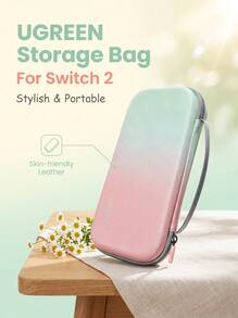 UGREEN Switch2 Lightweight Travel Case, Drop-Proof And Pressure-Resistant Semi-Hard Shell Protective Cover, With Built-In Handle And Fleece Lining, Black And Pink Gradient For A Unique Look, Easily Fits Into A Backpack For Business Trips And Commutes. - View 1