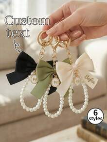 1pc Customized Name Pearl Bow Keychain, Bridesmaid Gift Accessory, Silk Ribbon Bow Bag Charm, Elegant Engraved Key Ring, Wedding Party Favor, Bridal Shower Gift - Multicolor - View 1