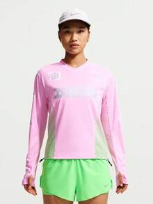 Nike Women's AS W NK SWIFT JERSEY TOP LS NV Long Sleeve Knit Collarless T-Shirt TIM7543-621 - Bubblegum Pink - View 1