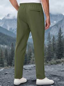 KEFITEVD Men's Winter Softshell Track Pants, Warm Fleece-Lined 4-Way Stretch Straight-Leg Sweatpants With Drawstring Waist And 3 Zip Pockets For Daily Wear - Army Green - View 3
