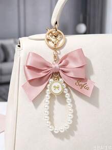 1pc Customized Name Pearl Bow Keychain, Bridesmaid Gift Accessory, Silk Ribbon Bow Bag Charm, Elegant Engraved Key Ring, Wedding Party Favor, Bridal Shower Gift - Multicolor - View 10