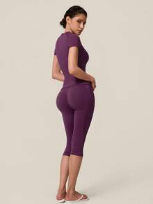 TimeOff Women's One Set Solid Color Seamless Round Neck Short Sleeve Ribbed Waist Mid-Length Pants Sports Set - Purple - View 7