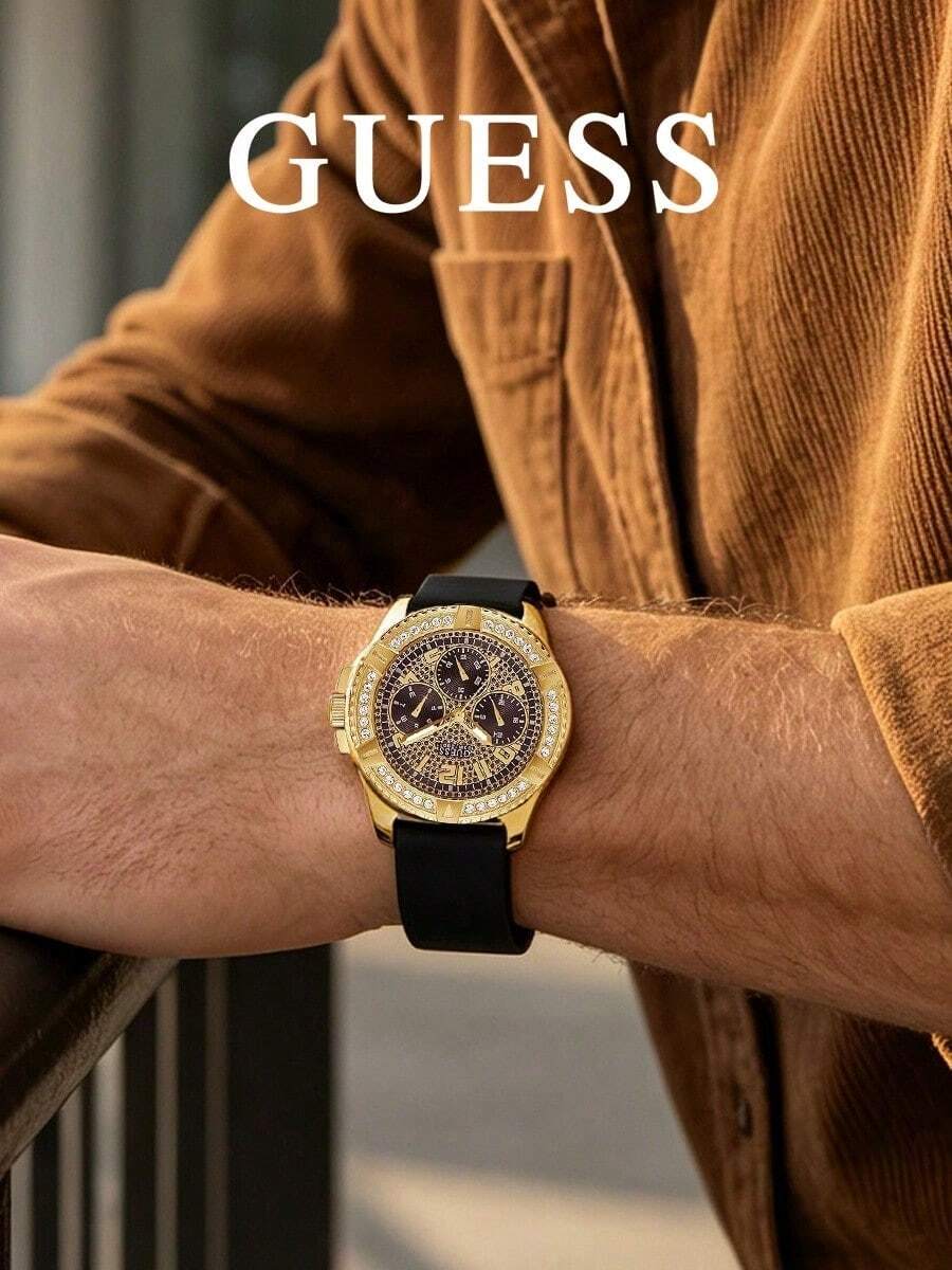 GUESS Women's Multifunction Quartz Watch, Gold-Tone Rhinestone Bezel, Starry Three-Dial Face, Skin-Friendly Black Silicone Strap, Street Style Large - Black - View 1