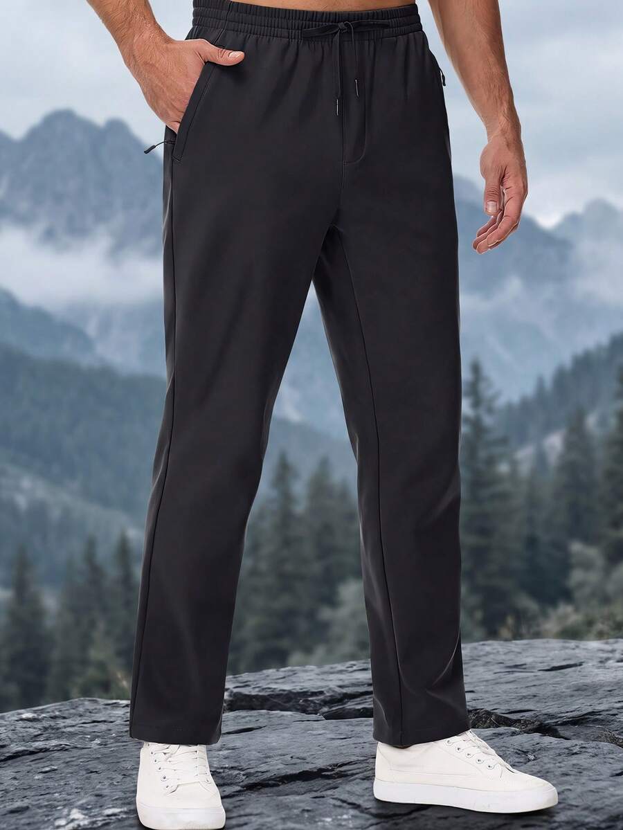 KEFITEVD Celana Track Softshell Musim Dingin Pria, Celana Sweatpants Hangat Berbahan Fleece dengan Lapisan Fleece, Peregangan 4 Arah, Potongan Lurus, Tali Serut di Pinggang, dan 3 Saku Resleting untuk Pemakaian Sehari-hari - Hitam - View 1