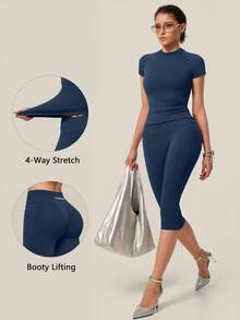 TimeOff Women's One Set Solid Color Seamless Round Neck Short Sleeve Ribbed Waist Mid-Length Pants Sports Set - Navy Blue - View 1