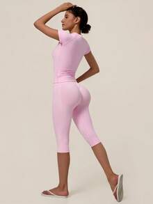 TimeOff Women's One Set Solid Color Seamless Crew Neck Short Sleeve Ribbed Waist Mid-Length Pants Sports Set - Pink - View 5