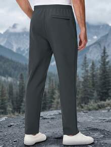 KEFITEVD Men's Winter Softshell Track Pants, Warm Fleece-Lined 4-Way Stretch Straight-Leg Sweatpants With Drawstring Waist And 3 Zip Pockets For Daily Wear - Dark Grey - View 3