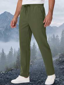 KEFITEVD Men's Winter Softshell Track Pants, Warm Fleece-Lined 4-Way Stretch Straight-Leg Sweatpants With Drawstring Waist And 3 Zip Pockets For Daily Wear - Army Green - View 2
