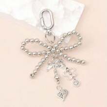 1pc Silver-Grey Faux Pearl Bow Pendant, Suitable For Women, Includes Faux Pearl And Heart-Shaped Pendant, Cute And Fashionable Keychain And Bag Accessory, Hollow Design - Silver - View 3