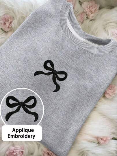 1pc Soft Minimalist Women's Crew Neck Sweatshirt, Small Black Bow Embroidery Patch, Autumn/Winter Campus Top