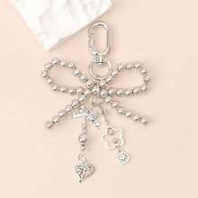 1pc Silver-Grey Faux Pearl Bow Pendant, Suitable For Women, Includes Faux Pearl And Heart-Shaped Pendant, Cute And Fashionable Keychain And Bag Accessory, Hollow Design - Silver - View 6