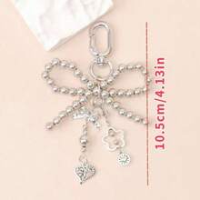 1pc Silver-Grey Faux Pearl Bow Pendant, Suitable For Women, Includes Faux Pearl And Heart-Shaped Pendant, Cute And Fashionable Keychain And Bag Accessory, Hollow Design - Silver - View 5
