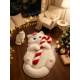 White Cat Lying down With a Christmas Cane