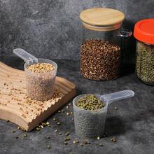 عبوة من 2 أكواب قياس شفافة صغيرة مع مقياس، أوعية قياس صغيرة سعة 120 مل للمنظفات والطبخ واستخدام المطبخ - أبيض - مشاهدة 2