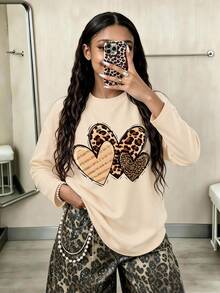 This Stylish Leopard Print And Heart Print Long Sleeve Pullover, In Apricot Color, Is Perfect For Tween Girls. Its Simple Yet Fashionable Design Makes It An Ideal Choice For Casual Everyday Wear, Especially During The Autumn And Winter Seasons. - Apricot - View 1