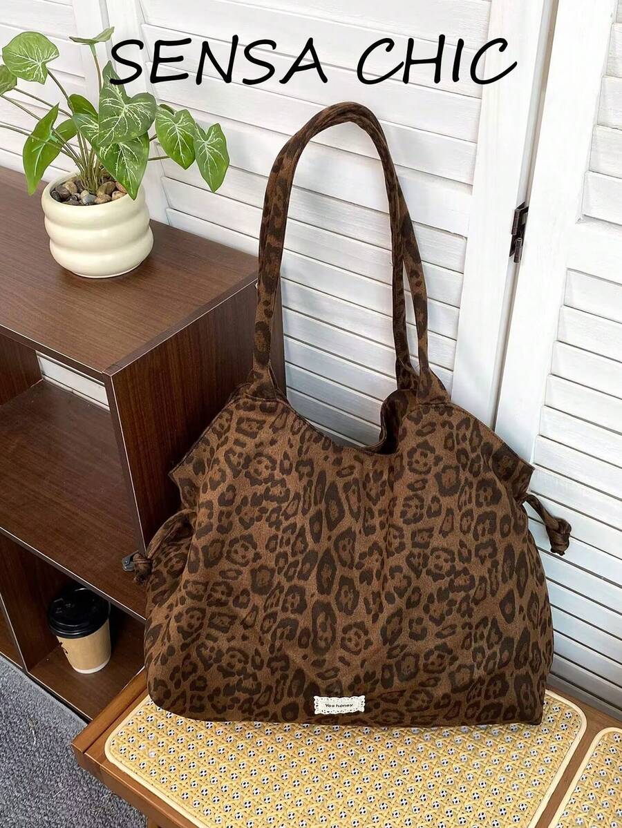 Bolso Tote de Lona de Algodón Grueso Cepillado con Estampado Integral de Leopardo Marrón Vintage, Decoración de Etiqueta de Tela con Nudo y Cordón Lateral, Gran Capacidad, Boca Abierta, Estilo Retro Americano Hot Girl, Bolso de Hombro, Bolso de Mano, Bolso de Axila, Correa Larga, Adecuado para Escuela, Desplazamientos, Viajes Cortos, Atuendo de Otoño/Invierno, Bolso Dumpling con Estampado de Leopardo de Vibra Relajada - Marrón - Ver 1