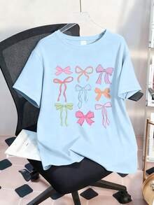 Camiseta de cuello redondo con estampado de lazo para niñas preadolescentes, top casual suave para primavera/verano - Celeste - Ver 1