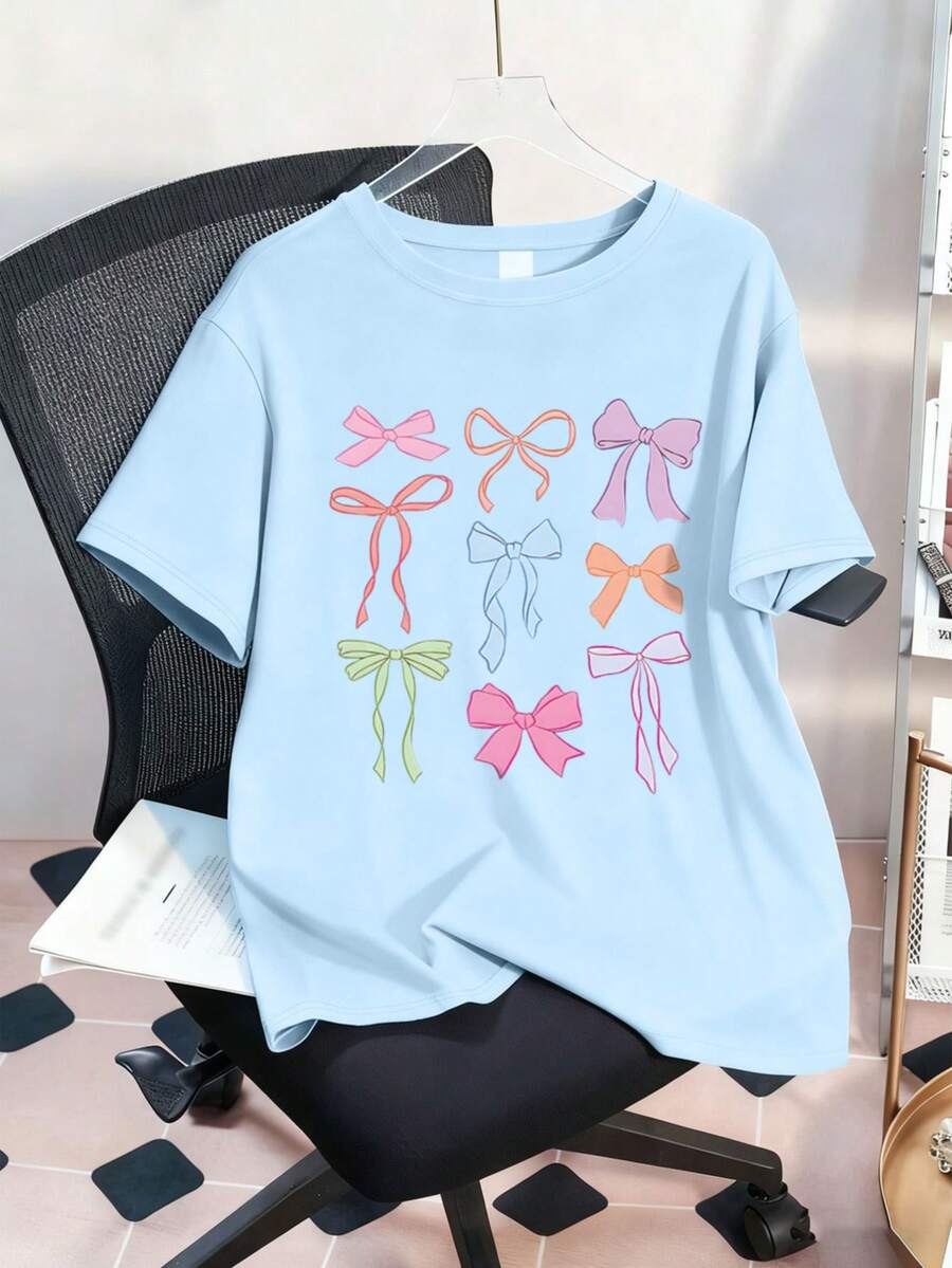 Camiseta de cuello redondo con estampado de lazo para niñas preadolescentes, top casual suave para primavera/verano - Celeste - Ver 1
