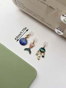 2pcs/3pcs Elegant Deep Sea Color Shell Pendant Dust Plug, Premium Alloy Oil-Drip Shell Starfish Fish Tail Phone Dust Plug Charm, Simple Convenient Universal Phone Earphone Hole Charging Port Dust Plug Waterproof Dust Plug - Multicolor - View 7