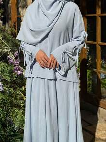 Two Pieces Summer Outfit: Textured Crepe Top With Bow Design & Extra Flared Midi Skirt With Pockets - Baby Blue - View 7