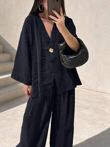 女款優雅兩件式夏季寬鬆套裝，深V領長袖上衣與鬆緊腰口袋長褲，高低開衩下擺，開學季特別場合教師節休閒穿搭，秋季輕薄薄款女裝 - 藏蓝色 - 查看 1