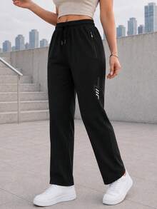 Women's Black Drawstring Jogger Pants With Zipper Pockets And Reflective Detail, Tapered Active Pants For Daily Wear - Black - View 1